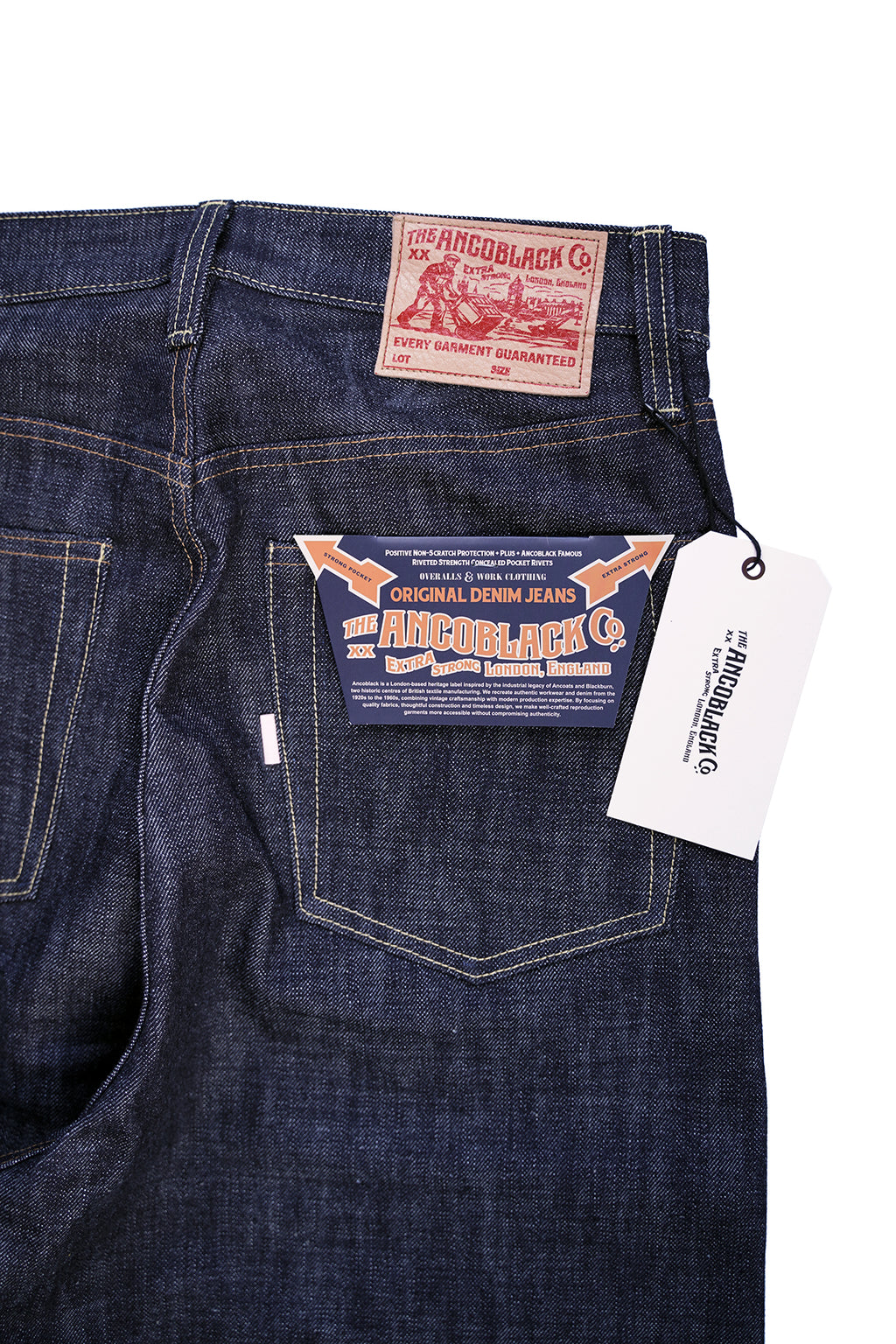 Ancoblack 4700xx back pocket detail with white tab, flasher tag, and vintage deerskin leather patch