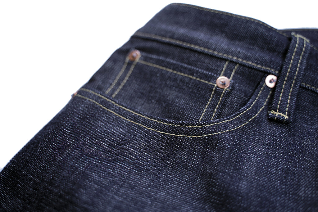 Ancoblack 4700xx front coin pocket detail with solid copper rivets on raw selvedge jeans