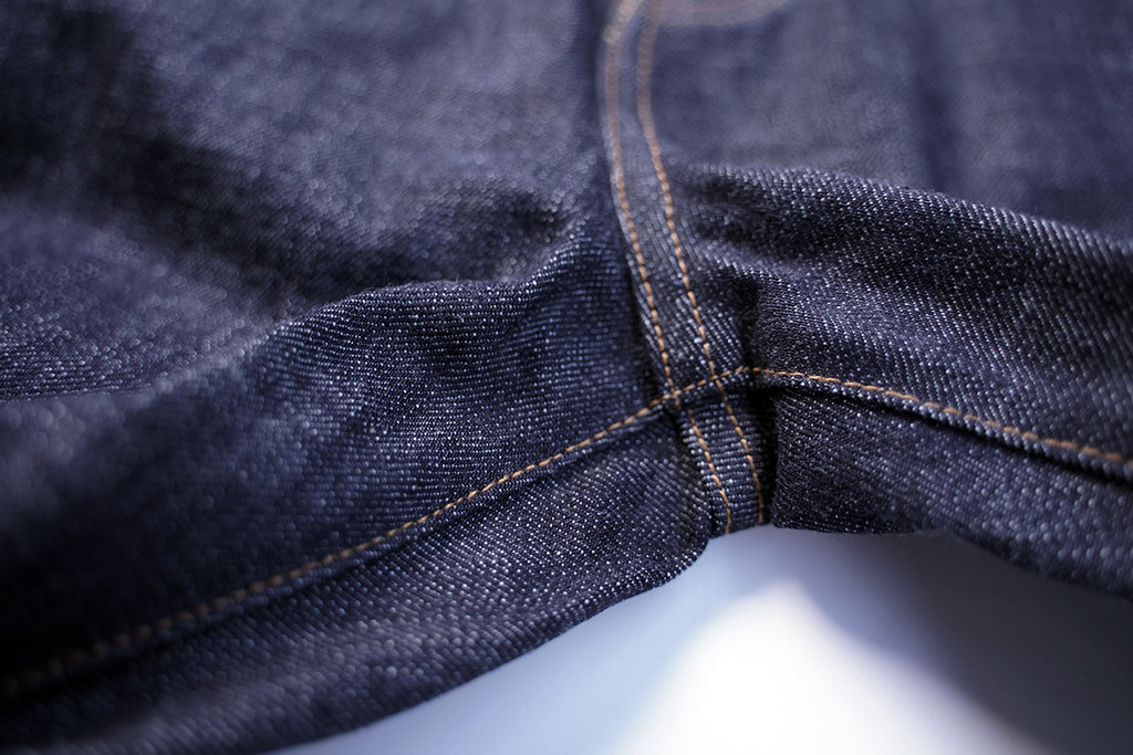 Ancoblack 4700xx raw denim crotch construction detail with heavy-duty reinforced stitching
